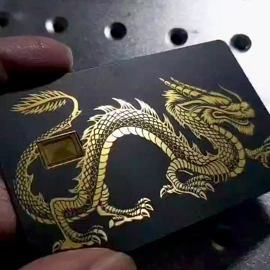 Video reel showcasing Dragon metal card in multiple color variations, highlighting premium metal card craftsmanship, luxury design, and elite international appeal